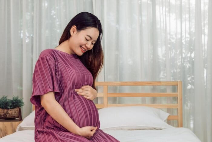 cách massage giảm đau đầu cho bà bầu